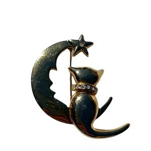 Gold tone Cat on a crescent moon brooch with rhinestone accents by Angel
